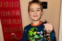 August Aitken donated 13 inches of hair.