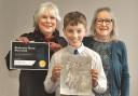 Ben Tennant, of Touch Primary School, took first prize in the art competition. He's pictured with Anne McFarlane and Dot Adams.