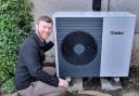 Gordon Spowage, Technical & Outreach Manager with an air source heat pump
