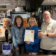 The team at the Hillend Tavern are celebrating being named CAMRA Pub of the Year for Scotland and Northern Ireland.