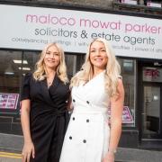 Laura Mowat, left, and Stacey Parker outside the estate agents that bears their names.