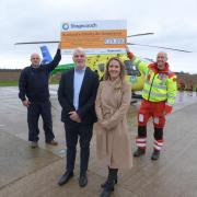 Stagecoach donates £25,000 to Scotland's Charity Air Ambulance, from left, Captain Allan Bryers; Depute Chief Executive Doug Cross; Head of Corporate Communications Charlotte Somerville; and Paramedic Michael Haines.