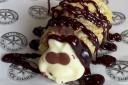 A Dunfermline chippy is selling a mini Colin the Caterpillar cake - covered in batter.