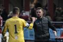 Barry Ferguson, with ex-Pars goalkeeper David Hutton, of Brechin City, at the end of last night's 2-1 win, says Kelty Hearts will not set up to defend their lead in Sunday's return. Photo: Jim Payne.