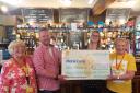 Quiz haul. Pictured, left to right, are Cathy Scott, chair of the Marie Curie fundraising group for Dunfermline, the Commercial Inn's Andrew Black, Danielle Valaitas, the charity's committee fundraiser for Fife, and volunteer Irene Duncan.