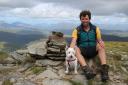 Ross and Dex at the top of his final Munro, Mòruisg.