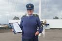Flt Lt Price with the Currie Sword