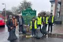 The group of eight who spent their New Year's morning cleaning up the park.