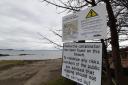 Work to remove radioactive pollution on Dalgety Bay foreshore has been repeatedly delayed.