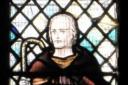 The stain glass of St Fillan at St Fillan's Church.