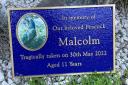 The plaque which has been placed at Malcolm's burial site. Photo: Peacocks in Pittencrieff Park.