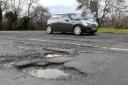 Giving 'priority' to filling potholes has led to delays in Fife Council housing improvements.