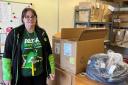 Julie with Asda's donations to the Children's Clothing Bank Dunfermline.