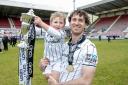 Joe Chalmers, and son Nolan, show off the trophy. Photo: Craig Brown.
