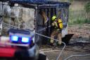 Firefighters on the scene in Rosyth where a workers' cabin was destroyed in a blaze.