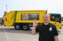 Kenny Armour of Andy's Man Club promoting the charity's advert on a bin lorry supporting men's mental health. Image: Fife Council