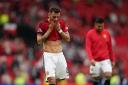 Bruno Fernandes appears dejected after Manchester United’s defeat to Brighton (Martin Rickett/PA)