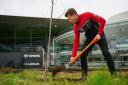 Rory Butcher has been planting trees at racing venues around the country in a bid to offset his carbon footprint.
