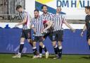 The Pars players celebrate during last night's win. Photo: Craig Brown.