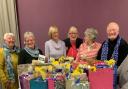 Soroptimists with the bags ready for handing over.