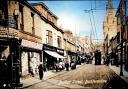 The view up Bridge Street where a variety of shops were situated selling the articles required for furnishing houses.
