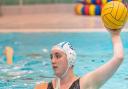 Dunfermline Water Polo Club's Niamh Moloney has helped Great Britain's senior women reach the European Water Polo Championship quarter-finals.