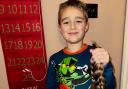 August Aitken donated 13 inches of hair.