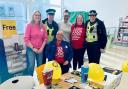 Tesco colleagues Irene, Catherine and Vicky, store manager Sam and community police officers Colin and Ailsa.