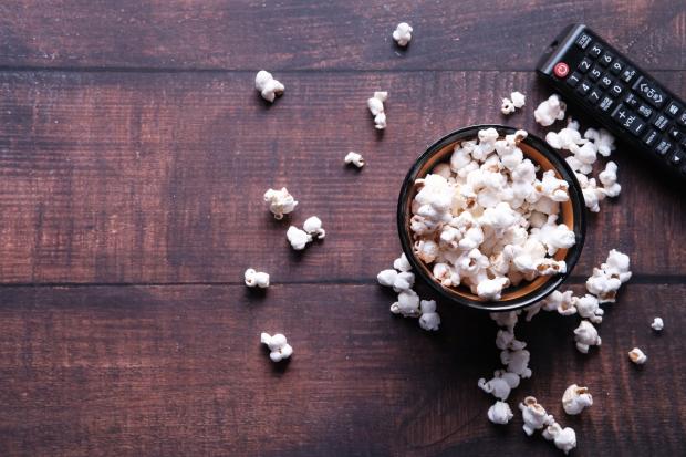 Dunfermline Press: A bowl of popcorn and a TV remote (Canva)