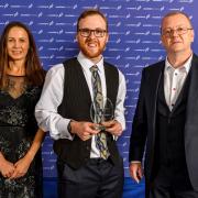 Owen Miller (centre) with Jo Pavey and Paddy Burns after receiving his award. Photo: Bobby Gavin.