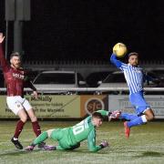 Nathan Austin scores the winner for Kelty Hearts at Stenhousemuir. Photo: Dave Johnston / Alba Pictures.