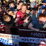 Darren Jamieson celebrates with the fans following Kelty Hearts' title success last month. Photo: Dave Wardle.