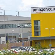 A worker at Amazon in Dunfermline was caught stealing mobile phones.
