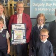 Dalgety Bay Primary youngsters bid a fond farewell to retiring minister Christine Sime