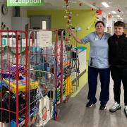 Alex with the family's delivery of toys for the Sick Kids Hospital.
