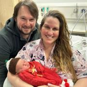Sarah and Mark Hanney with their baby girl, born on Christmas Day.