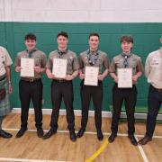 East Scotland Scouts Region President Alex Duncan, Explorer Scouts Jack Howieson, Andrew Livingstone,  Ronan Dunn, Adam Hill and Dunfermline Scouting's Lead Volunteer, Alan Davidson.