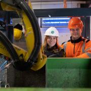 Zoe Cook and David Goodenough with one of the robots put into operation at the Cireco run facility in Dunfermline.