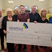 Aberlour Children's Charity receiving the cheque from the Dunfermline Soul Club.