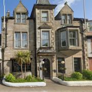 An auction of items from Aberdour's Woodside Hotel is being held.
