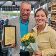 Lauren after her surprise with her grandfather, George McDonald, owner of Fairley's Garden Centre.