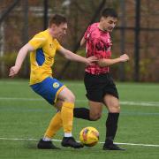 Action from Saturday's derby draw between the Swifts and Crossgates Primrose.