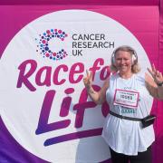 A Dunfermline woman is celebrating completing the Race for Life earlier this month.