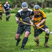 Aberdour remain unbeaten in Shinty's South Division One after a hard-fought draw at Col Glen. Photo: Paul Paterson.
