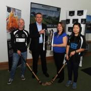 Lisa MacColl (third right) believes the future's bright for women's shinty. Photo: Dave Wardle.